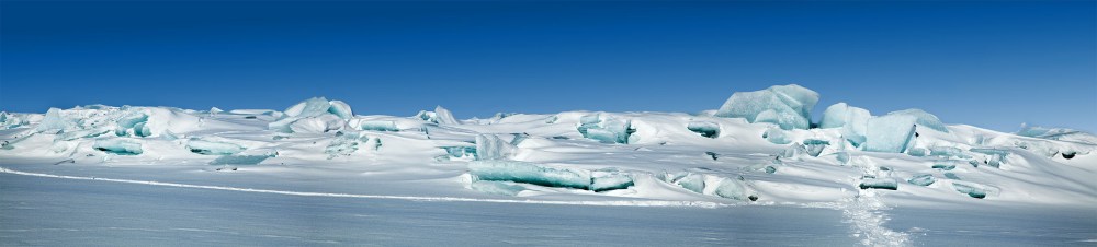 Beautiful ice shoves created by the wind moving ice onto the shore